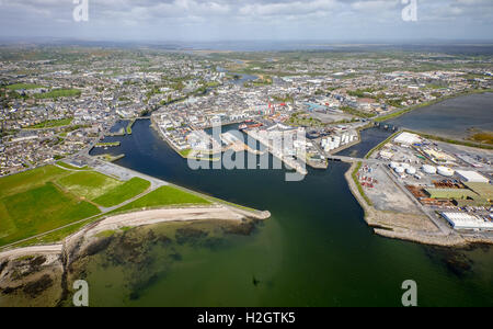 View of town and harbour, docks and Business Enterprise Park, Galway, County Clare, Ireland Stock Photo