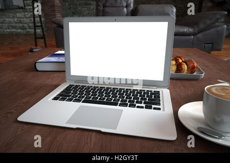Laptop on desk, with blank screen. 3D illustration. Stock Photo