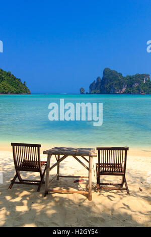 Bamboo table and chairs on beautiful bay of Koh Phi Phi  Thailand Stock Photo
