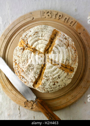 Artisan organic sour dough wholemeal seed bread loaf with white, malted and rye flour Stock Photo