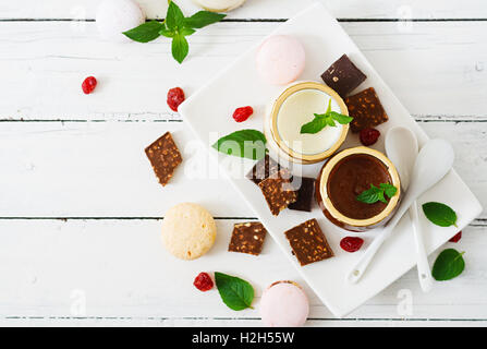 Chocolate and vanilla panna cotta (dessert). Top view Stock Photo