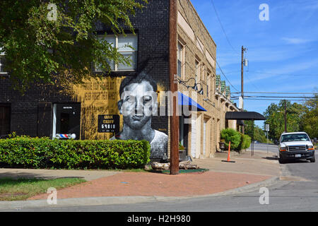 A mural is painted in the Oak Cliff, Bishop Arts District to recall Lee Harvey Oswald and his assassination of John F Kennedy. Stock Photo