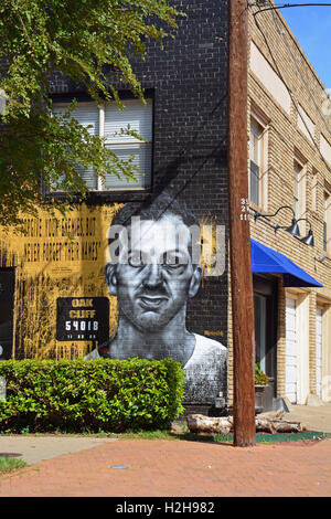 A mural is painted in the Oak Cliff, Bishop Arts District to recall Lee Harvey Oswald and his assassination of John F Kennedy. Stock Photo