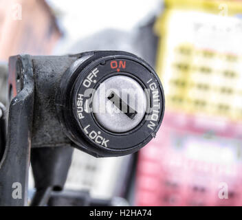 Close up of vintage motorcycle key hole, ignition switch Stock Photo