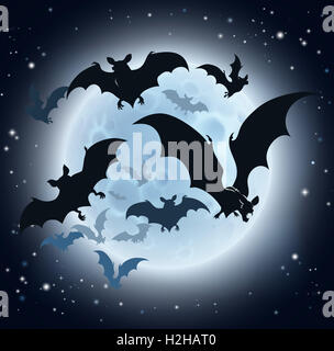 A Halloween background featuring vampire bats and a full moon Stock Photo