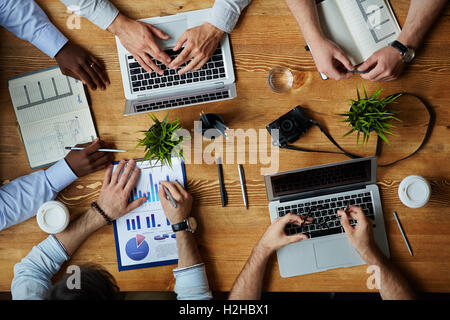 Financial managers analyzing new tendencies on market Stock Photo