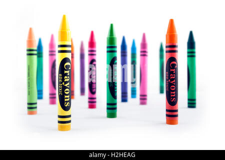 Vertical positioning crayons on white background Stock Photo