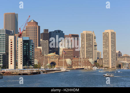 A photograph of the Boston Waterfront, as seen from a boat on Boston Harbor. Stock Photo