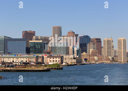 A photograph of the Boston Waterfront, as seen from a boat on Boston Harbor. Stock Photo