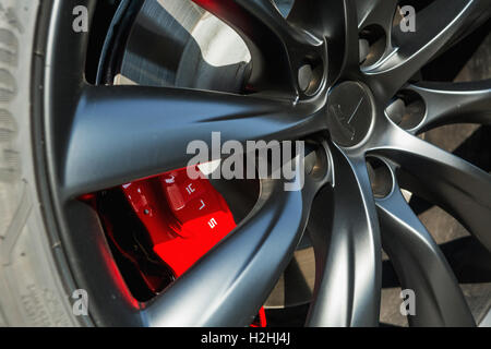 TILGURG, NETHERLANDS - SEPTEMBER 25, 2016: TESLA  MODEL-X. Detail on logo on wheel. Tesla Motors Assembly Plant in Tilburg, Neth Stock Photo