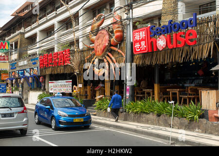 Indonesia, Bali, Kuta, Jalan Kartika, giant crab sign outside Seafood House restaurant Stock Photo