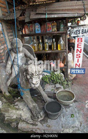 Indonesia, Bali, Ubud, Jalan Raya Peliatan, petrol for sale outside shop Stock Photo