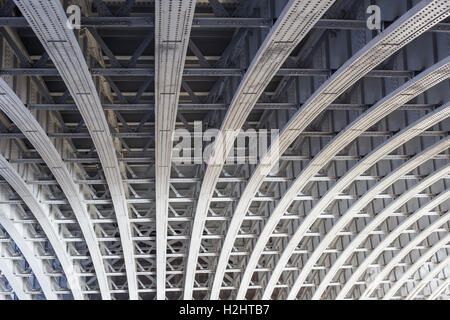 The underside of Blackfriars Railway Bridge over the River Thames with ...