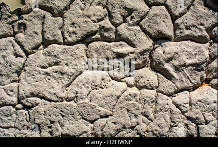 The old plastered wall that is completely dilapidated. Stock Photo