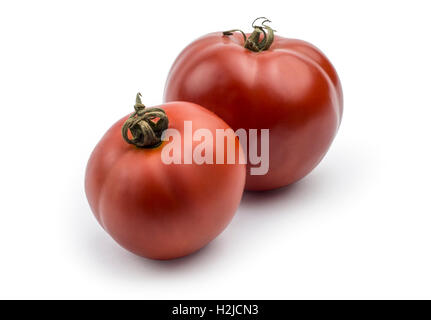 Tomatoes isolated on white background. Clipping path included in jpeg. Stock Photo
