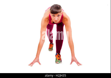 Young woman in ftness outfit prepare to run. isolated on white background. Stock Photo