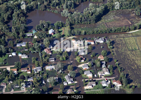 Aerial view of homes overwhelmed by flood waters from the Cedar River across regions of northeast Iowa September 26, 2016 near Cedar Rapids, Iowa. Spillover of the Cedar River, the worst Cedar Rapids has witnessed since 2008 was 6 feet above flood stage resulting in more than 10,000 people being evacuated. Stock Photo