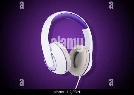 White and purple padded headphones isolated on purple background Stock Photo