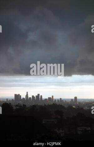 View of downtown Los Angeles skyline with cloudy skies from the Hollywood Hills Stock Photo