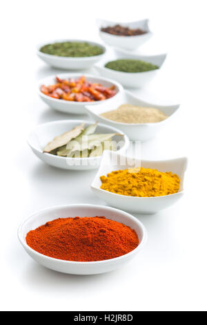 Various dried herbs and spices isolated on white background. Stock Photo