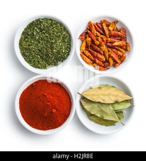 Various dried herbs and spices isolated on white background. Stock Photo