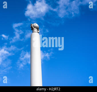 Modern closed circuit tv camera isolated against a blue sky. Stock Photo