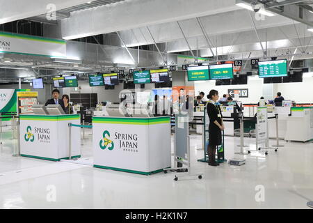 Spring Airline check in counter Narita Airport Japan Stock Photo