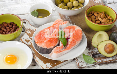 Food sources of unsaturated fats and Omega 3. Healthy eating concept. Stock Photo