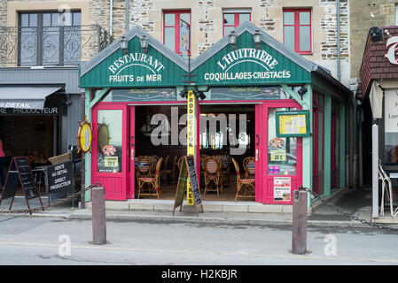 Seafood restaurants along harbour, Cancale, Brittany, France, EU, Europe Stock Photo