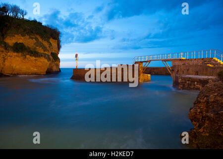 Long exposure of the evening tide at the Port des pecheurs, Biarritz, Basque Country, France Stock Photo