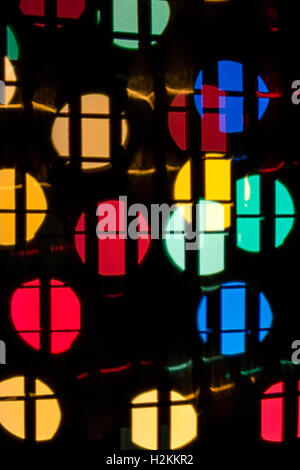 bokeh circles of different colors through which the black stripes Stock Photo