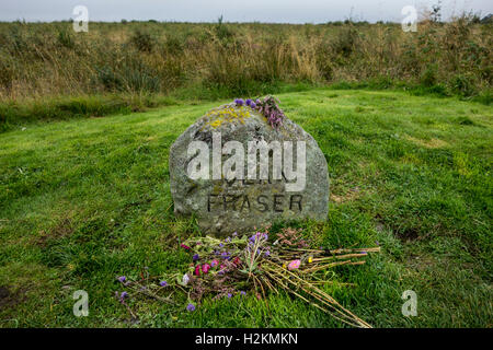 Headstone marking mass grave of fallen Jacobite soldiers of the clan Fraser on the Culloden Battlefield near Inverness, Scotland Stock Photo
