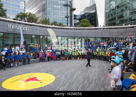 London, UK. 29th Sep, 2016. Local schoolchildren welcome the Mayor of London, Sadiq Khan, to launch the new London Curriculum for primary schools at the London Curriculum Festival at the Scoop. More than 1,800 primary schools across 33 London boroughs will be able to bring learning to life, inspired by London's people, places and heritage, as part of the new ‘Going Underground' unit on the London Curriculum. Credit:  Mark Kerrison/Alamy Live News Stock Photo