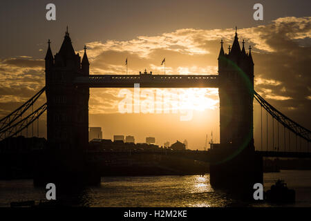 London, UK. 30th September, 2016. UK Weather: Sunrise over Tower Bridge in central London Credit:  Guy Corbishley/Alamy Live News Stock Photo