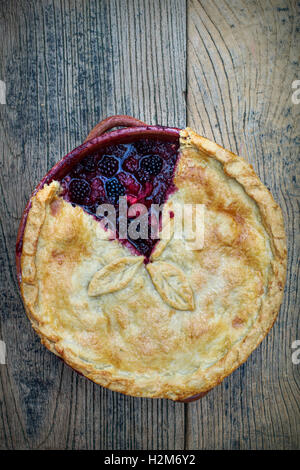 Homemade Blackberry and Apple Pie on wood Stock Photo