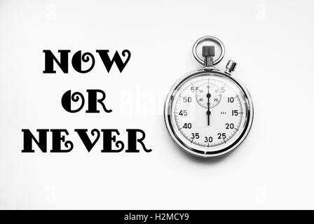Stopwatches with text: Now or never Stock Photo