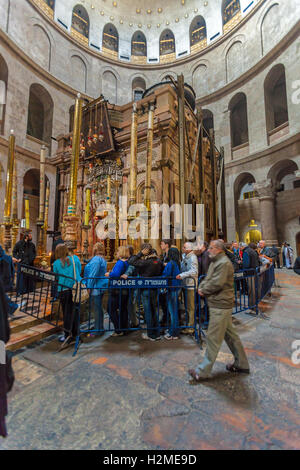 JERUSALEM, ISRAEL - FEBRUARY 17, 2013: Tourists waiting in long rows to enter Aedicule in Church of the Holy Sepulchre Stock Photo