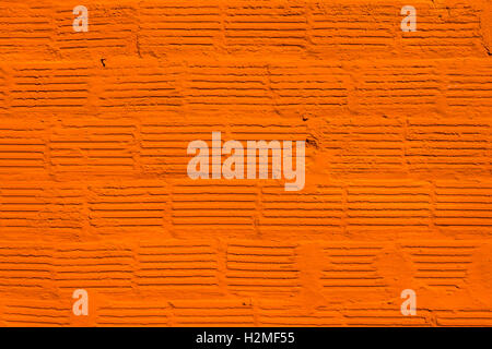 Orange Painted Brick Wall for Background Stock Photo