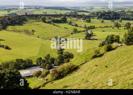 View of farm land and River Dove. In Crowdecote, Derbyshire, England. Stock Photo