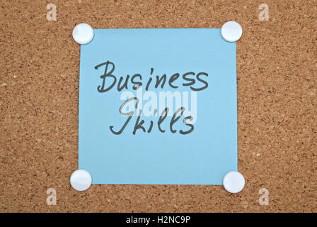 Text Business Skills written on a sticker pinned on a cork board Stock Photo