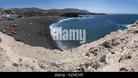 Fuerteventura, Canary Islands, North Africa, Spain: te boats and the black beach of Ajuy seen from the top of the caves Stock Photo