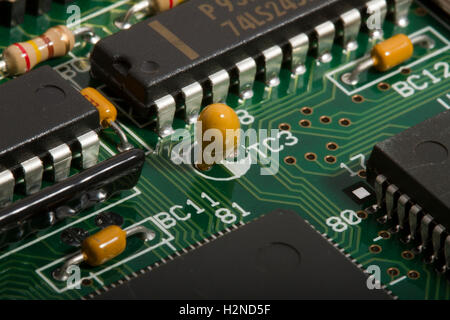 Electronic printed circuit board with components Stock Photo