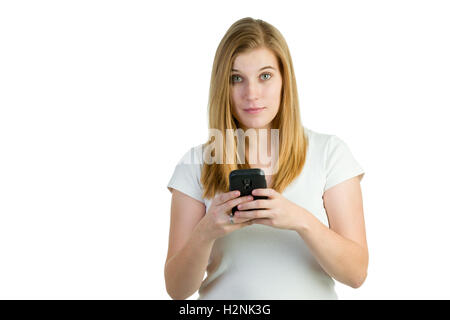 An attractive blond woman with a cellphone or smartphone Stock Photo