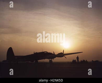Silhouette of B-17 Bomber 'Flying Fortress' at Sunset, Langley Field, Virginia, USA, Alfred T. Palmer for Office of War Information, July 1942