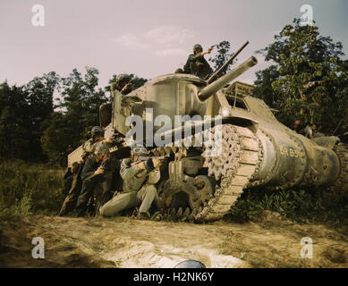 M-3 Tank and Crew using Small Arms, Fort Knox, Kentucky, USA, Alfred T. Palmer for Office of War Information, June 1942 Stock Photo