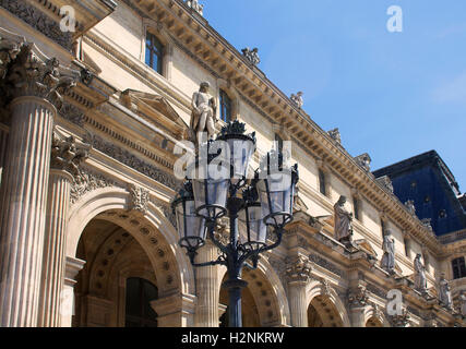 Traditional, old street lamp in front of Louvre Museum. Stock Photo