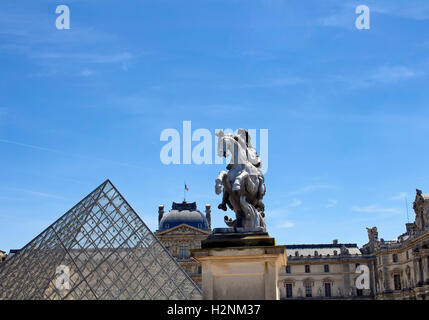 Statue of king Louis XIV in the courtyard of the Louvre museum. Made by Gian Lorenzo Bernini Stock Photo