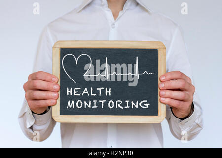 Health monitoring illustration written on chalkboard Stock Photo