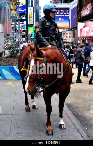 NYPD Officer on horseback in Times Square New York City, United Sates of America Stock Photo