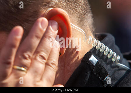 Bodyguard and earpieces, detail ear, security